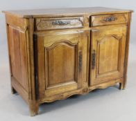 An 18th century French provincial walnut side cabinet,