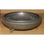 A pewter bowl