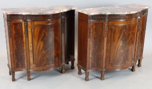 A near pair of 18th century style mahogany side cabinets,