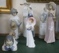 A collection of mixed Lladro, Nao and Doulton figures