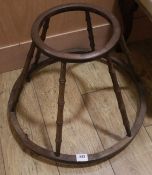 A 19th century beech baby walker and a stroller,