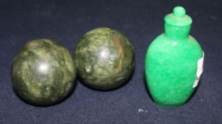 A jade snuff bottle and two balls