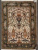A Persian blue ground carpet, with central medallion in a field of scrolling foliage, 13ft 1in by