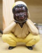 A painted plaster figure 'Optimum'