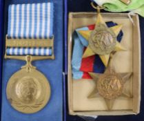 Two WWII medals and 2 Korea medals.