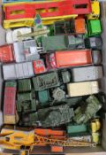 A collection of mostly Dinky and Matchbox commercial vehicles and military trucks, etc.