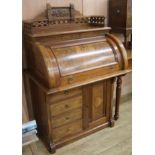 A late Victorian mahogany and walnut roll top desk, W.85cm