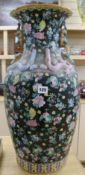 A large Chinese famille noire vase