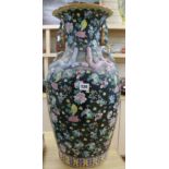 A large Chinese famille noire vase