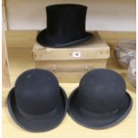 Two moleskin top hats and two bowler hats