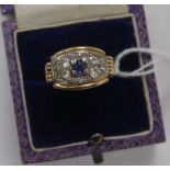 A 14ct gold, sapphire and diamond elliptical shaped cluster ring, size K.