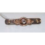 A diamond set bar brooch, 42mm