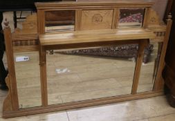 A pine overmantel mirror, W.107cm