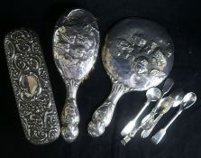 A silver mirror and two brushes decorated with Reynold's Angels and five plated spoons.