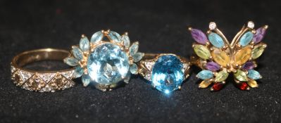 Four assorted 9ct gold and gem set rings.