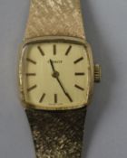 A lady's 9ct gold Tissot wristwatch.