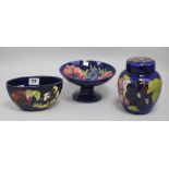 A Moorcroft ginger jar, a bowl and an oval vase