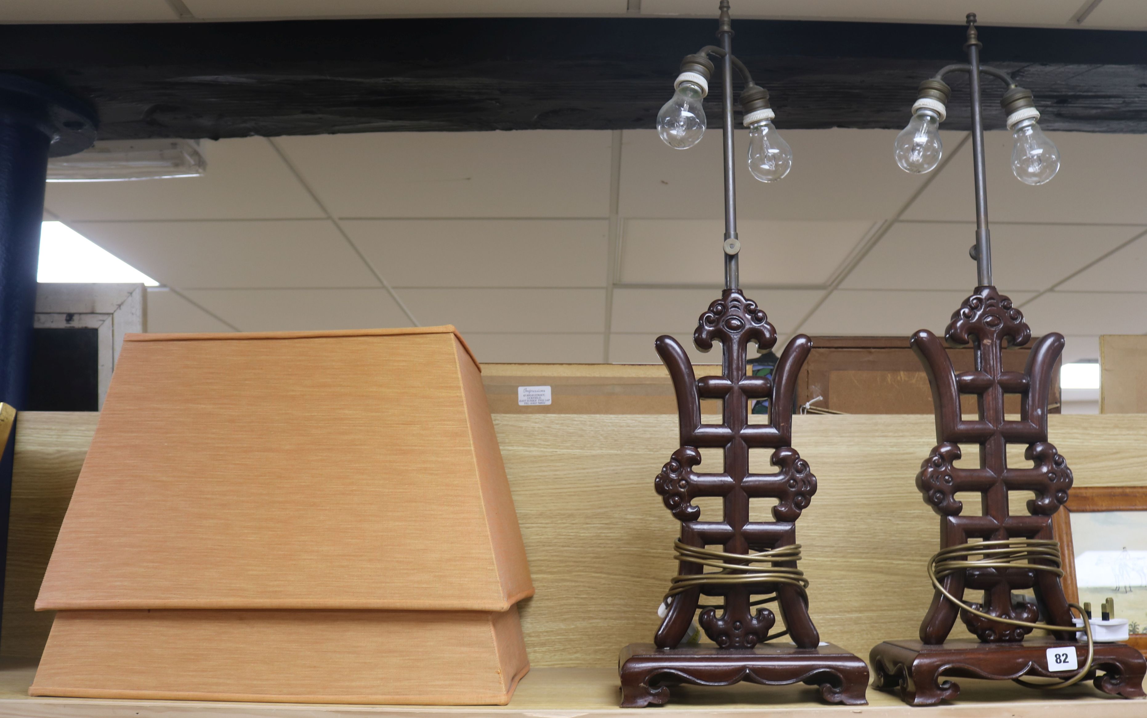 A pair of Chinese hardwood table lamps