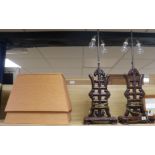 A pair of Chinese hardwood table lamps