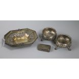 A 19th century silver snuff box, a pair of George III silver bun salts and a later silver