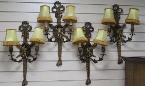 A set of four Victorian gilt gesso wall lights, H.66cm