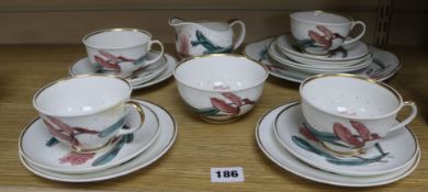 A Susie Cooper orchid designed part teaset