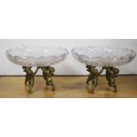 A pair of ormolu Putti centrepieces