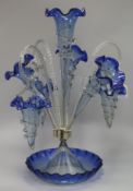 A Victorian blue tinged clear glass epergne