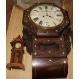 A Black Forest wall clock and a German miniature grandfather timepiece