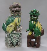 A large Chinese porcelain yellow Dog of Fo and a later green example