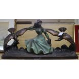 An Art Deco plaster model of a lady with birds