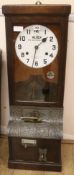 A Blick oak cased clock on / off clock H.98cm
