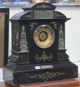 A large French black slate and gilt metal mantel clock