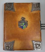 A German leather bound and metal mounted with crest 1912 photo album