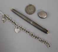 A sterling silver Parker pen, a Tiffany and Co silver bracelet, pill box and a George III coin