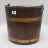 An oak and brass bound bucket