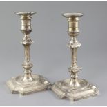 A pair of 1930's 18th century style silver candlesticks, with waisted knopped stems, Hawksworth,