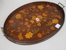 An Edwardian inlaid mahogany oval tray