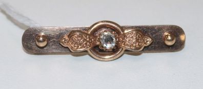 A diamond set bar brooch, 42mm