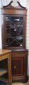 An inlaid mahogany corner cupboard, H.210cm