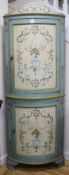 An Italian 18th century design painted bowfronted standing corner cupboard,