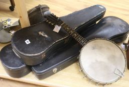 Three cased violins and a mandolin banjo, for restoration