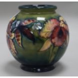 A Moorcroft 'green orchids' vase