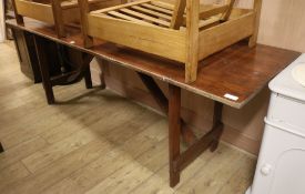 Stained pine tressel table W.228cm