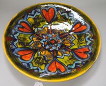 A Poole studio pottery charger signed Anita Harrison