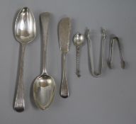 Two Georgian silver spoons and other cutlery.