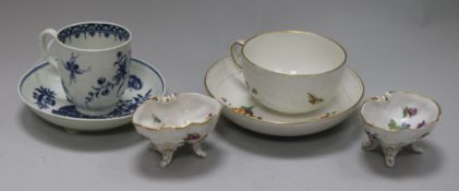 A 1st period Worcester blue and white cup and saucer, a KPM cup and saucer and a pair of Dresden