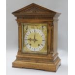 A late Victorian walnut bracket clock