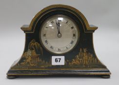 A 1920's black lacquer mantel timepiece