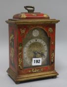 A red lacquer mantel timepiece